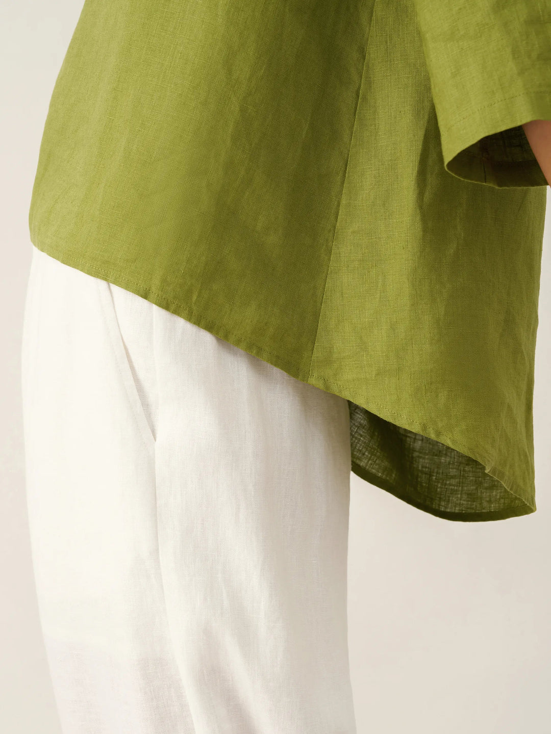 Brianna | Elegant Round-Neck Asymmetrical Hem Top